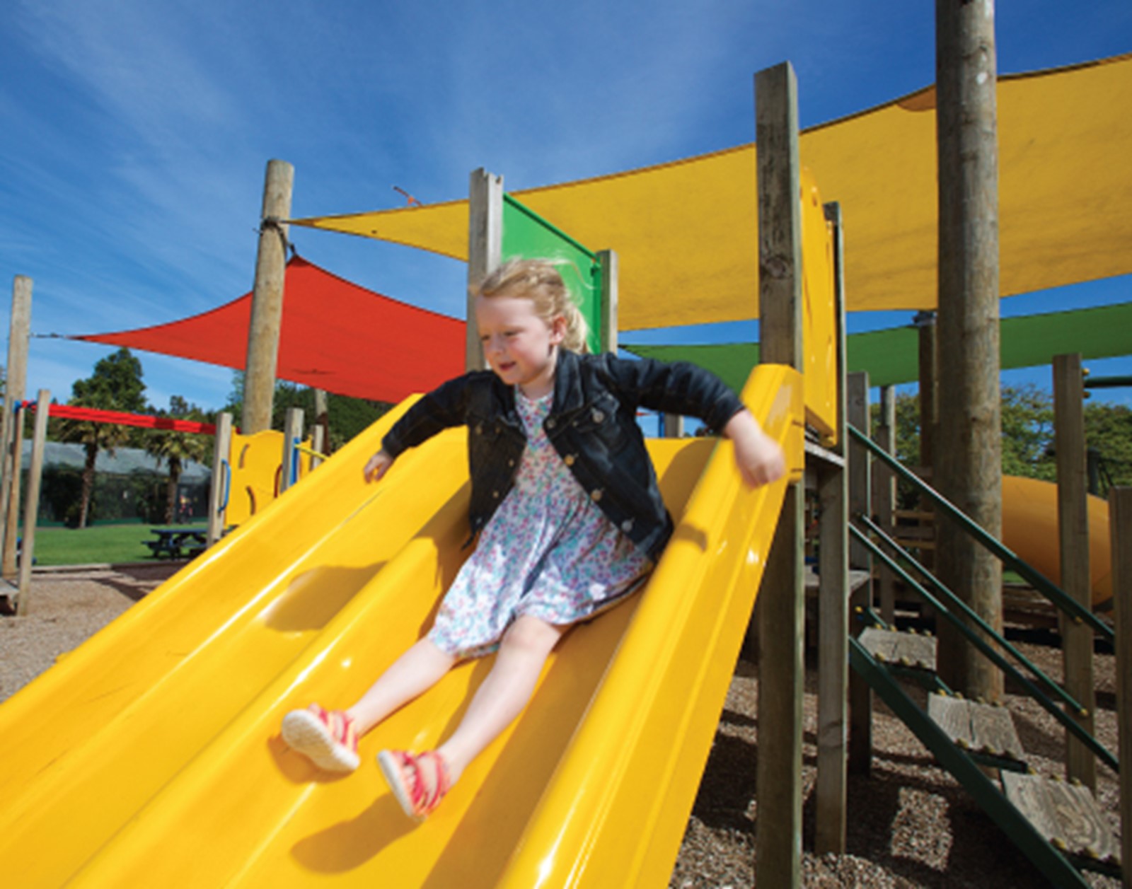 Child playing on slides