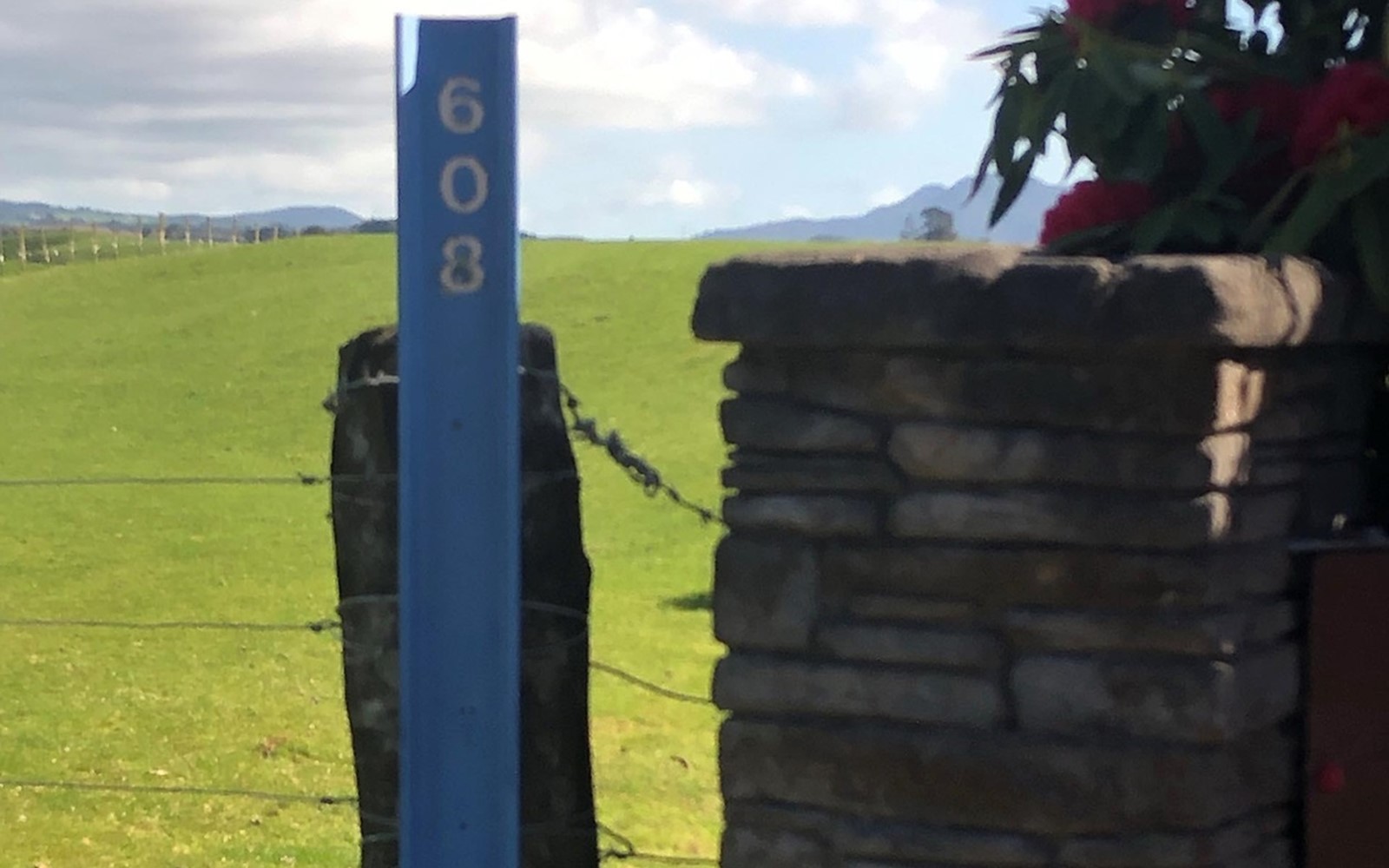 A Rural Property Number post.