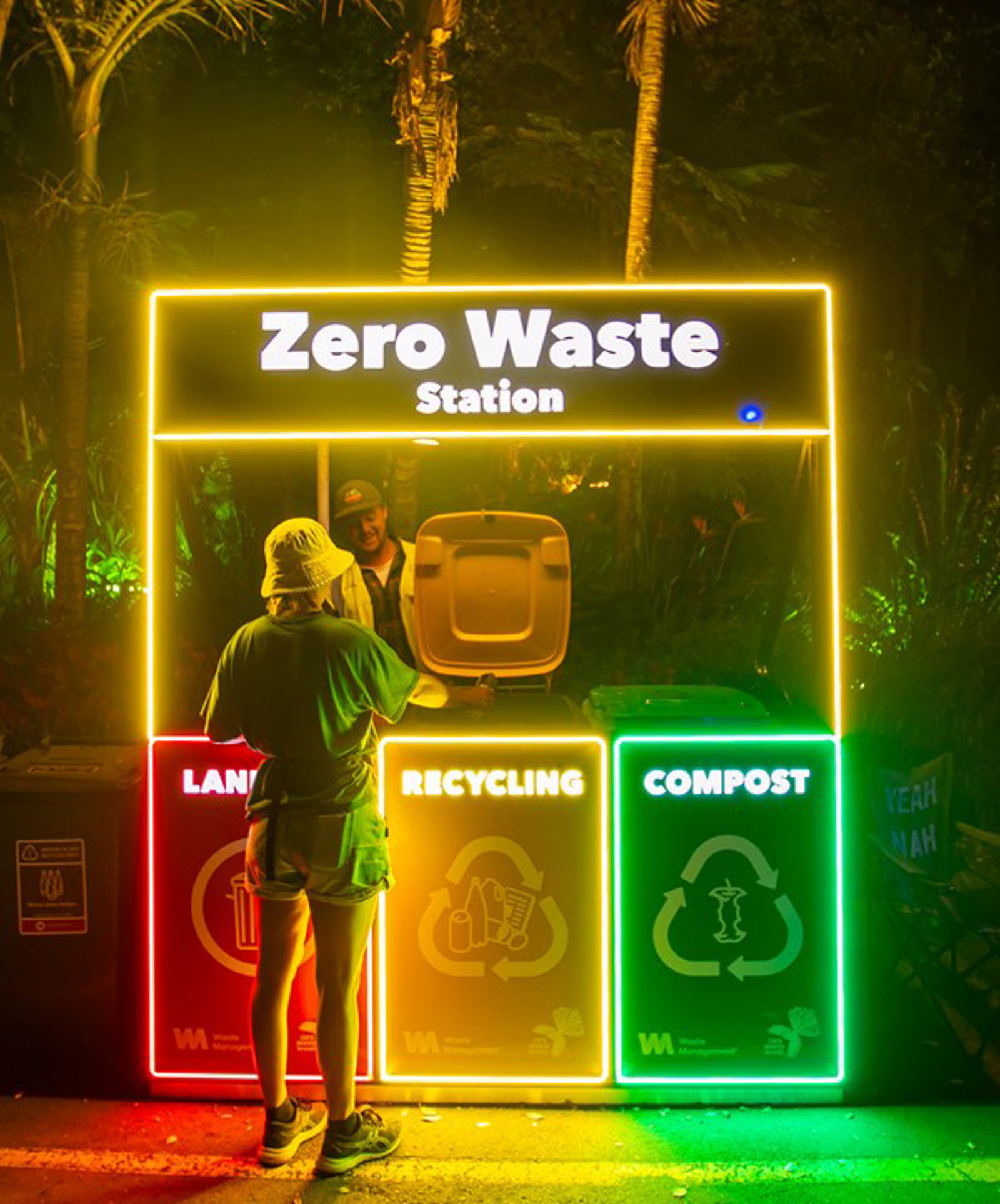 Volunteer at Zero Waste station.