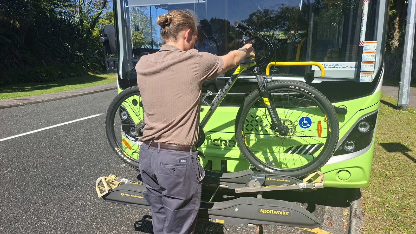 Bike on the front of a bus.