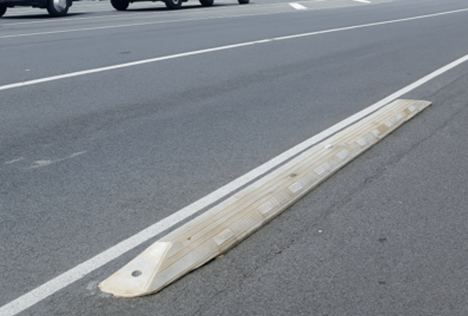 White rubber cycle separator on the road 